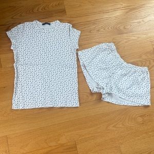 NWOT Brandy Melville Adorable Tee and Short Set. White and Purple/green Flowers.